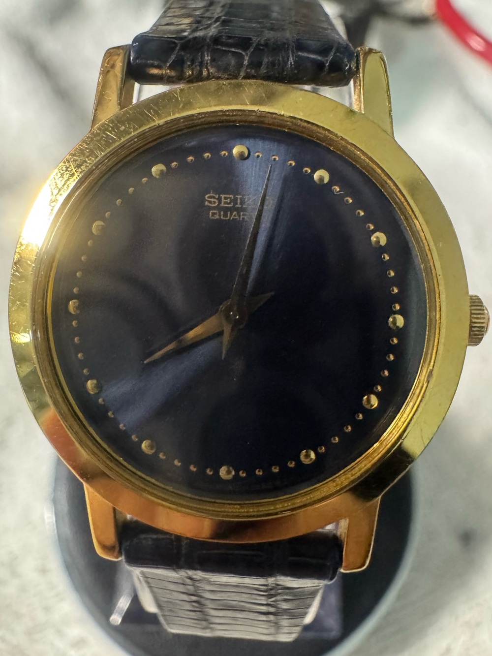 Seiko Gold-Tone Case Black Dial woman Dress Watch with Black Leather Strap
